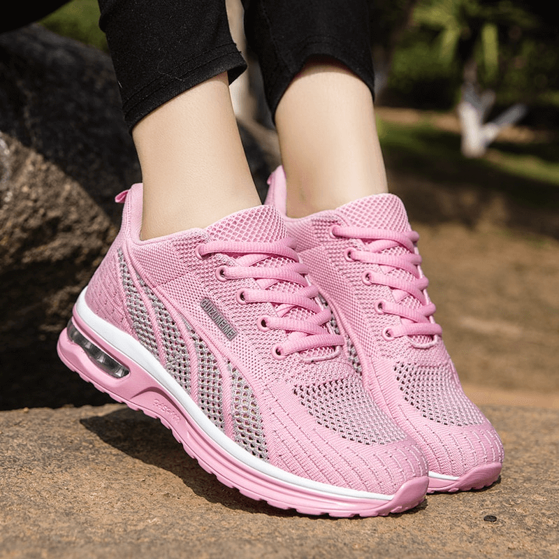 Pink mesh lace-up women's sneakers SF1414 with cushioning, ideal for active style-conscious ladies.
